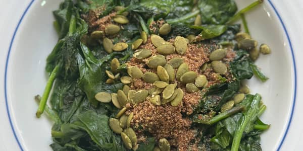 Leafy greens and pumpkin seeds — whole plant foods that support heart health and lower LDL cholesterol