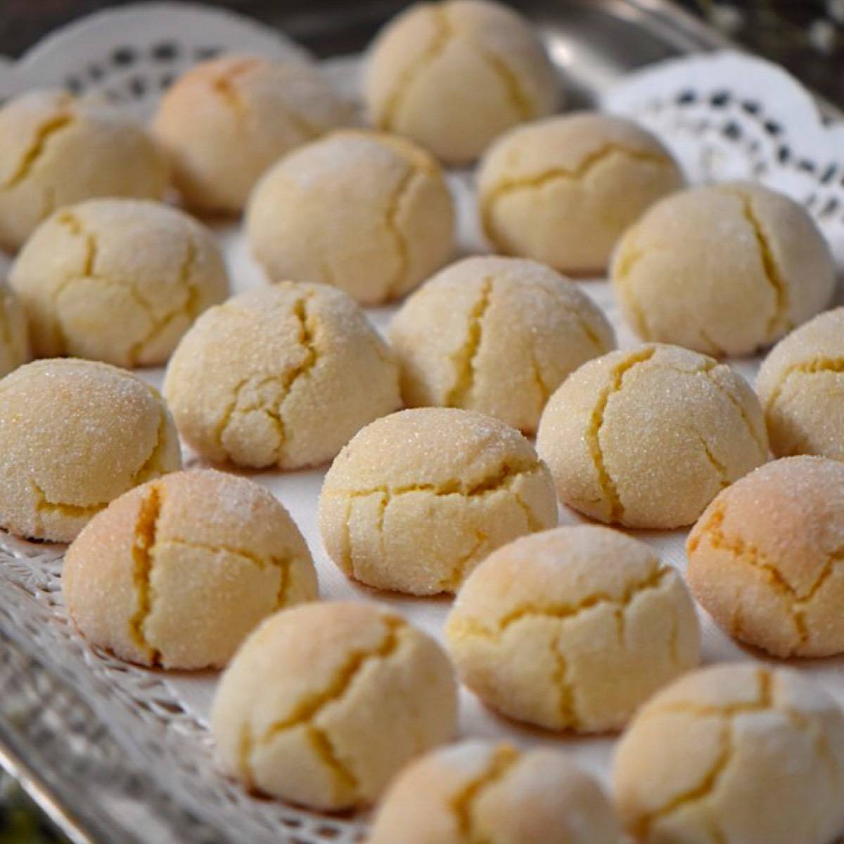 Amaretti cookies on a silver tray.