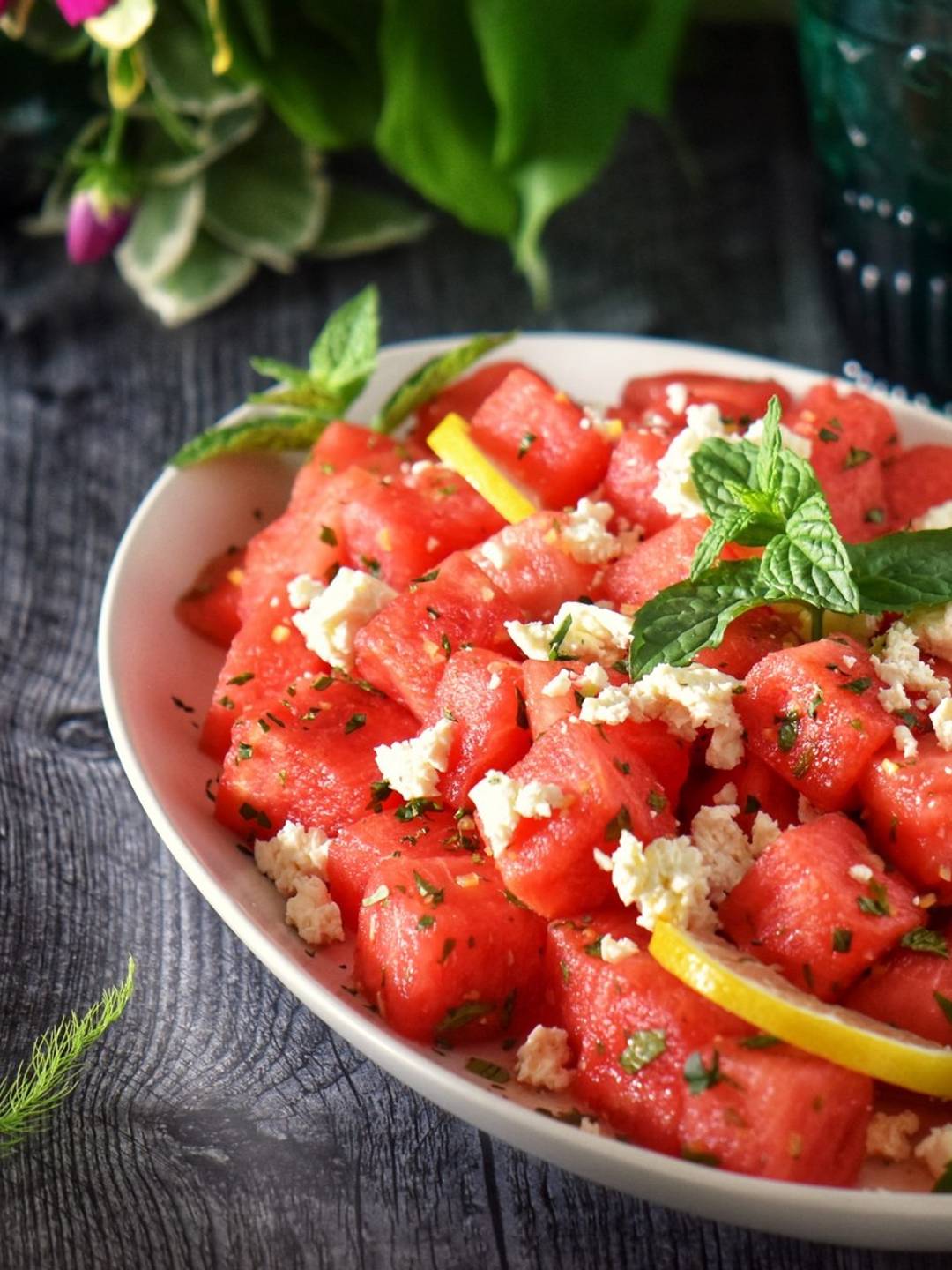 Watermelon feta salad in a white bowl.