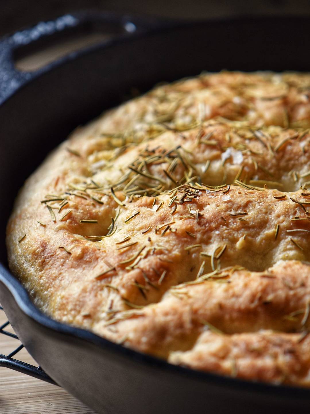 Focaccia in a cast iron pan.