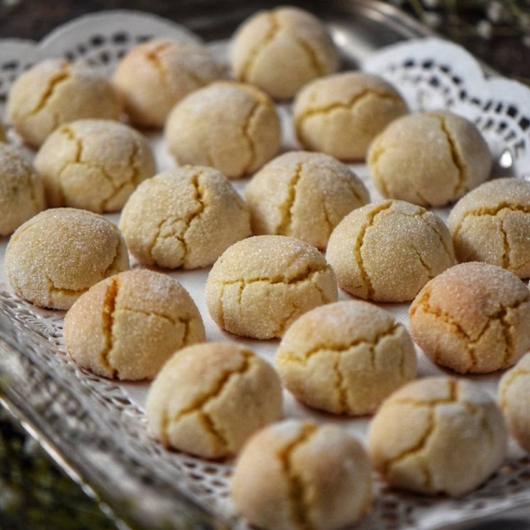 Amaretti cookies on a silver tray.