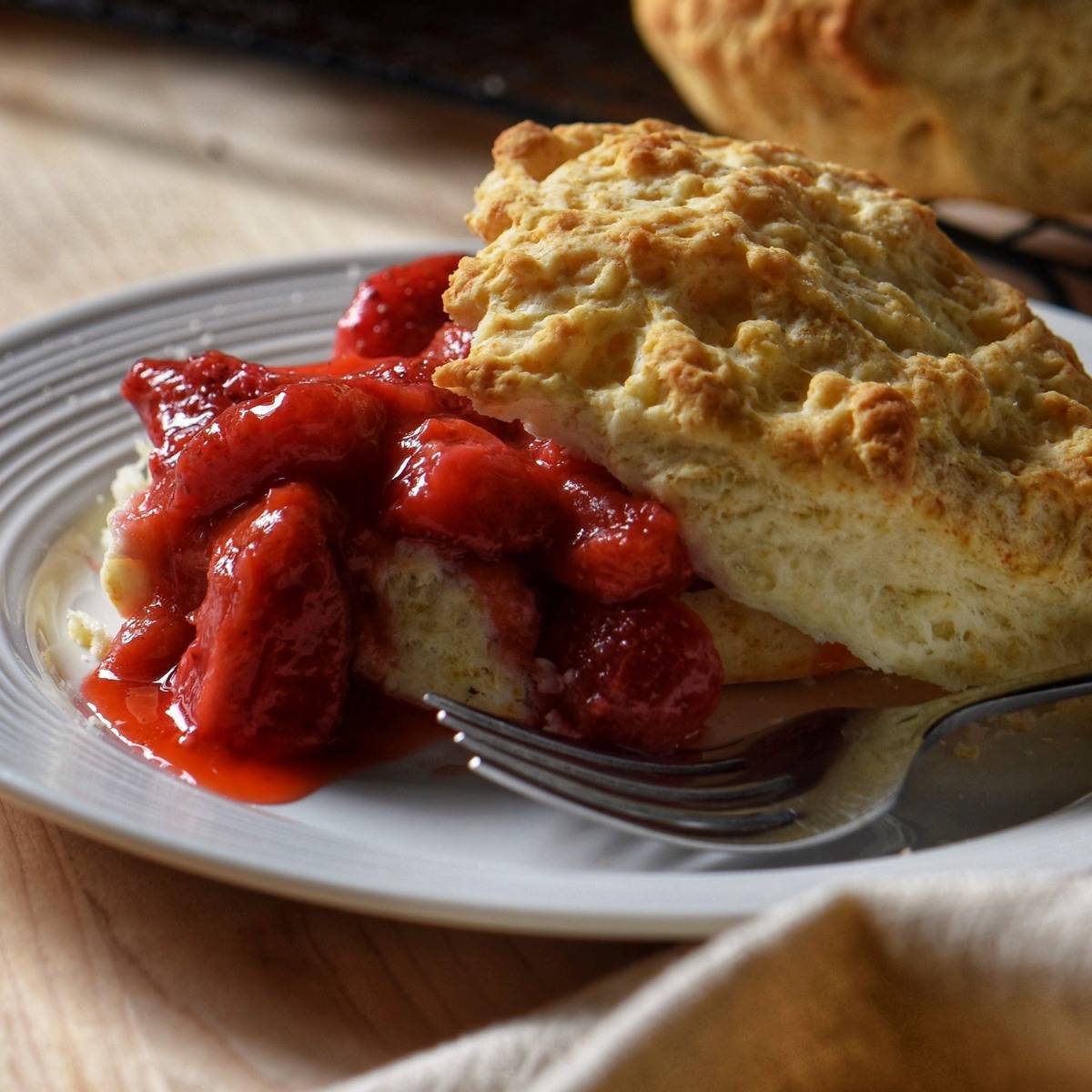 Strawberry rhubarb compote with a biscuit.