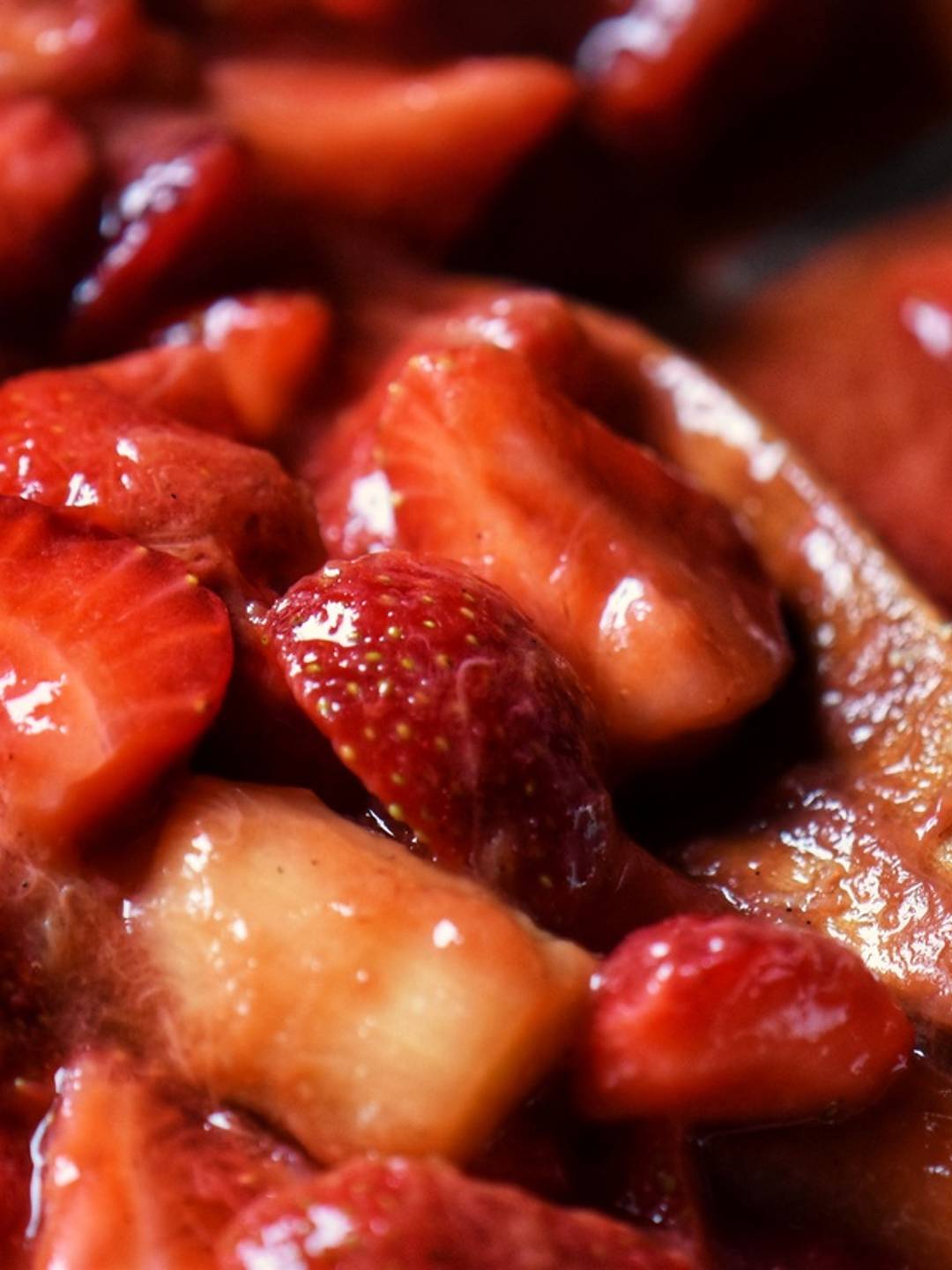 Strawberry rhubarb compote in a white plate.