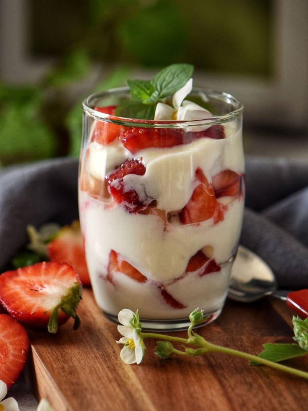 Ricotta and strawberries in a glass.