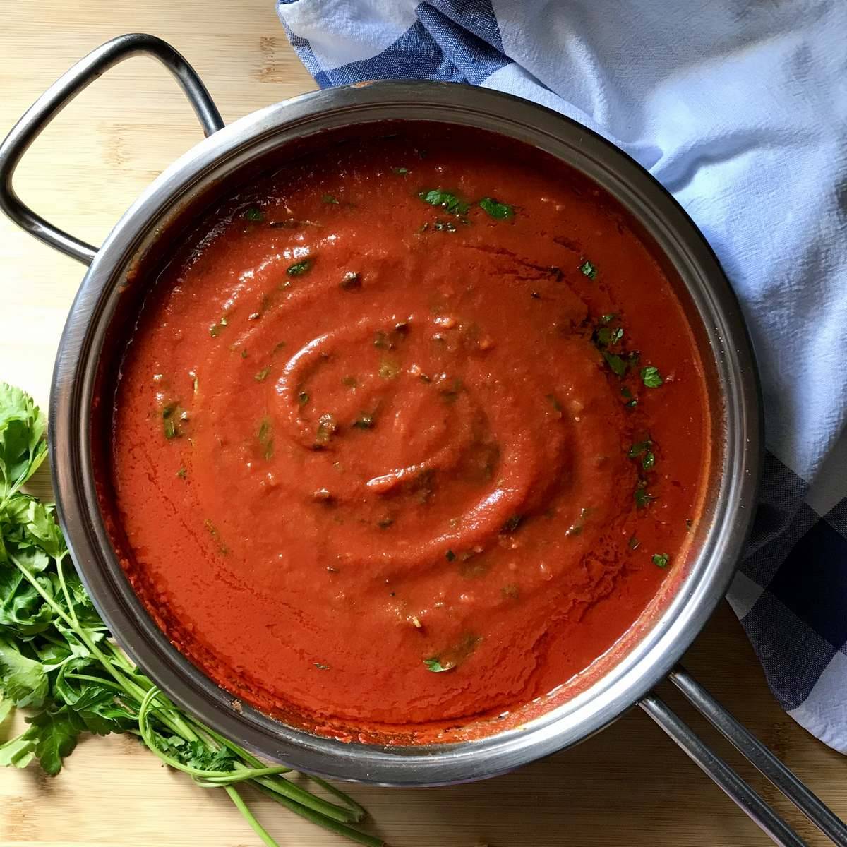 An overhead photo of a quick tomato sauce in a saucepan.