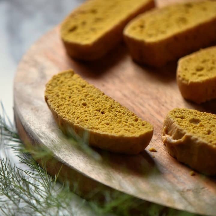 Pumpkin biscotti on a wooden surface