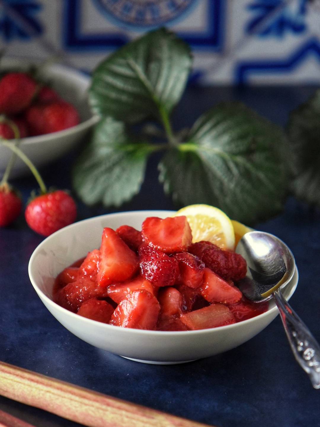 Strawberry rhubarb compote in a white plate.