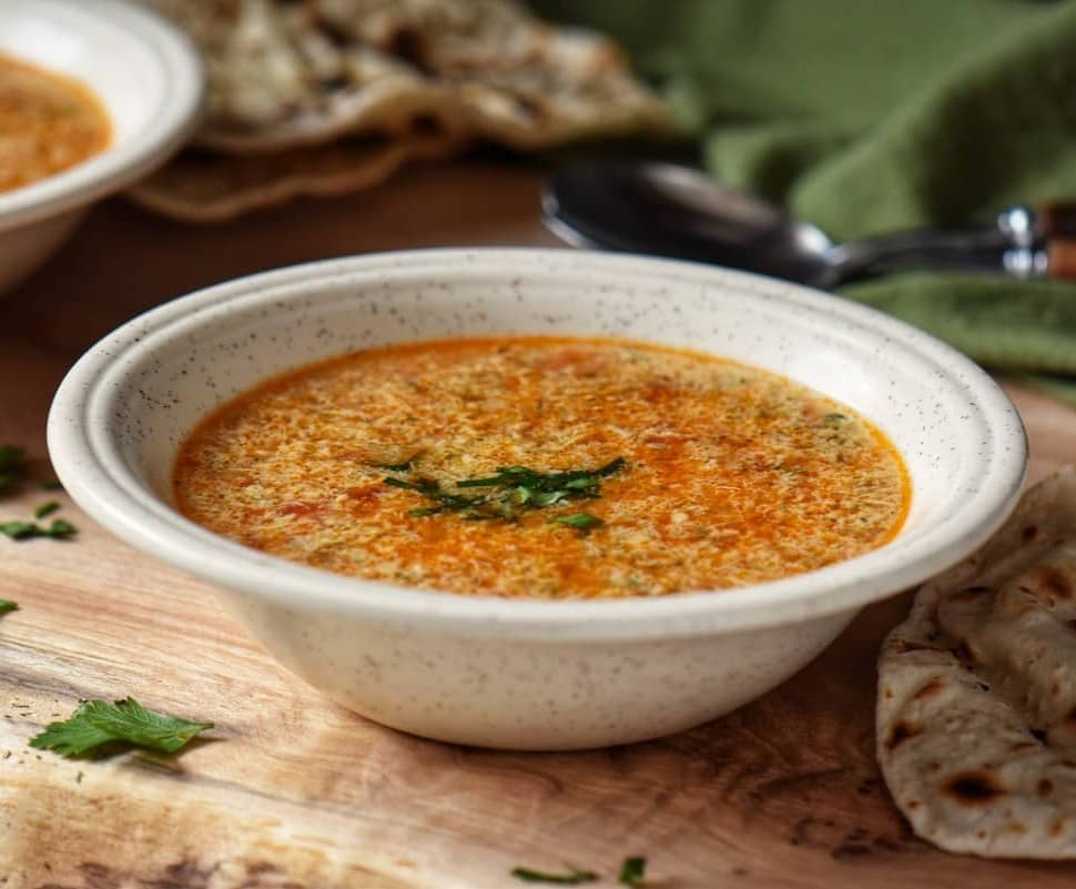 Egg drop soup in a bowl.