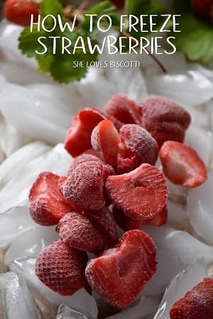 Frozen strawberries on ice.