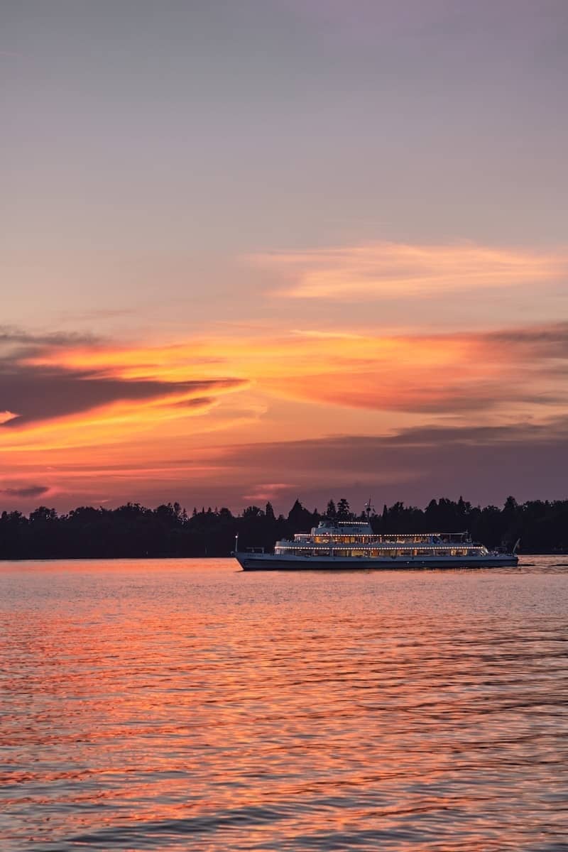 Lake constance sunset with passenger boat