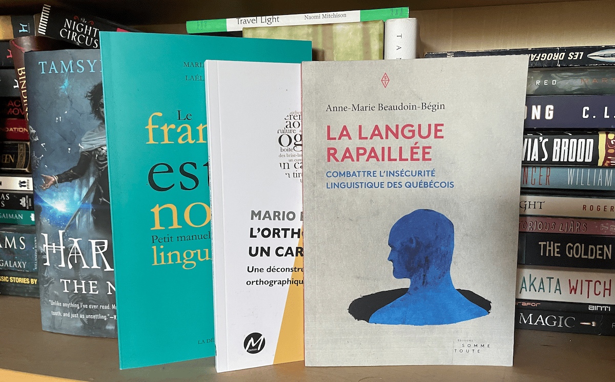 Photo of a shelf in my small library at home, featuring Beaudoin-Bégin's book, La langue rapaillée.