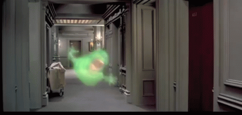 GIF from Ghostbusters with Slimer flying toward Peter