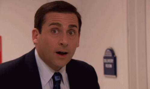 A gif of Michael Scott from The Office looking pleasantly surprised