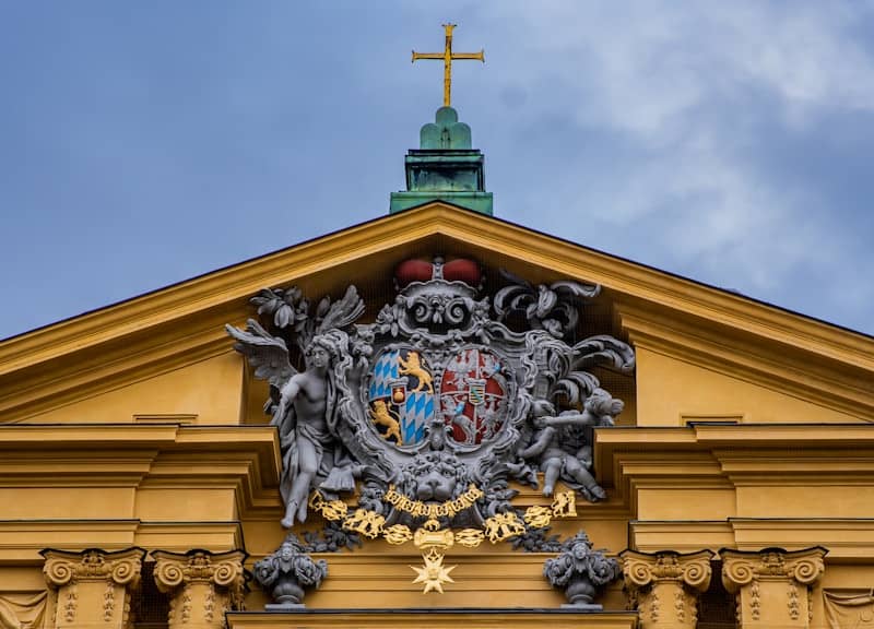 A large building with a cross on top of it