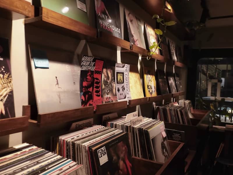 A record store filled with numerous vinyl records on display.