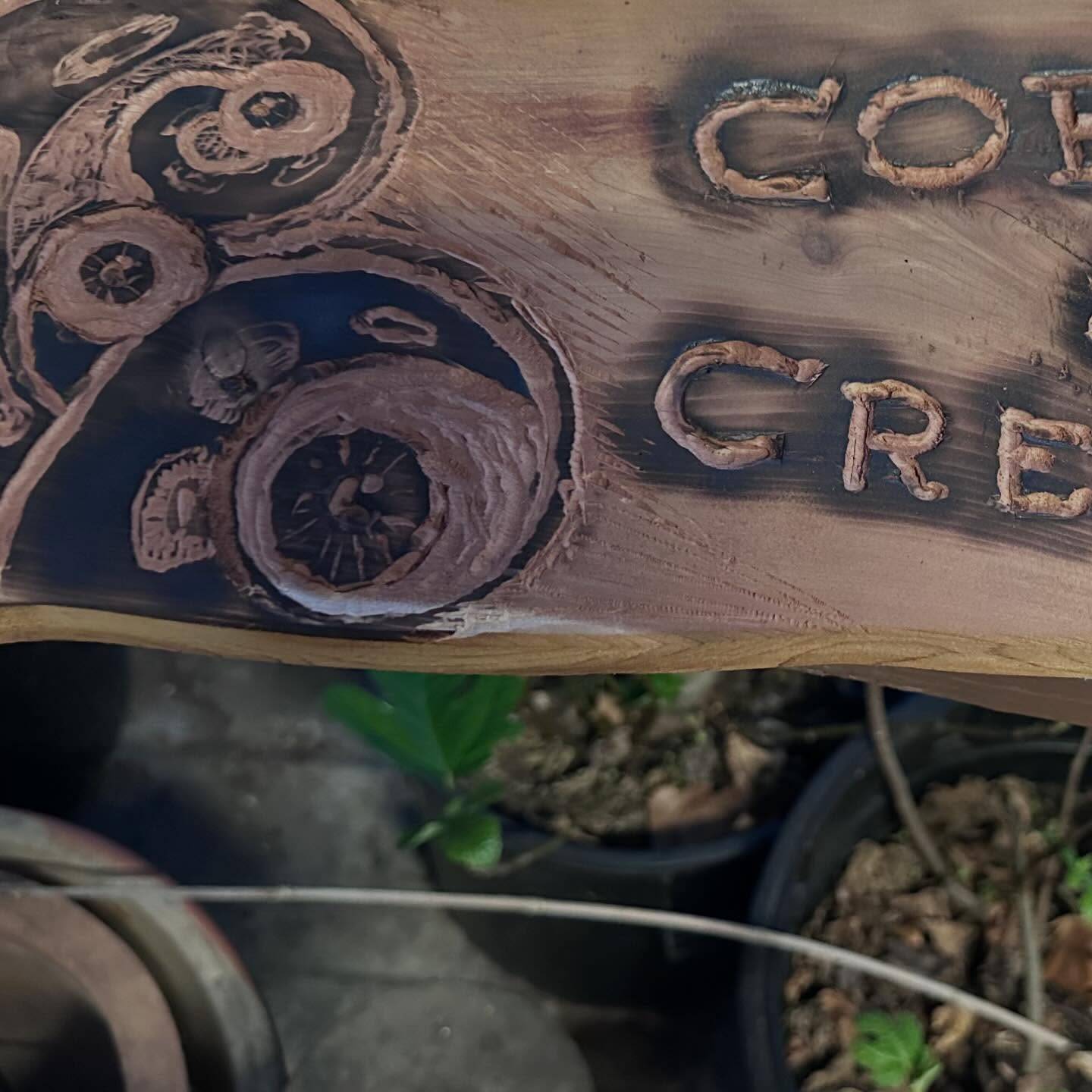 Wednesday work in progress post!
1. Clumsily carving a vintage bit o cedar (found at the local Habitat reStore) to make the new @coffeeandcreatures sign for this year’s vending, AND 
2. I started a composting program at the food pantry. By “program” I mean,”I take home the rotten fruit/veg and put them in the compost heap after weighing them (20 lbs, btw)”. I am gonna continue looking for a local farm to take our produce waste, but in the meantime, I am the composting program.