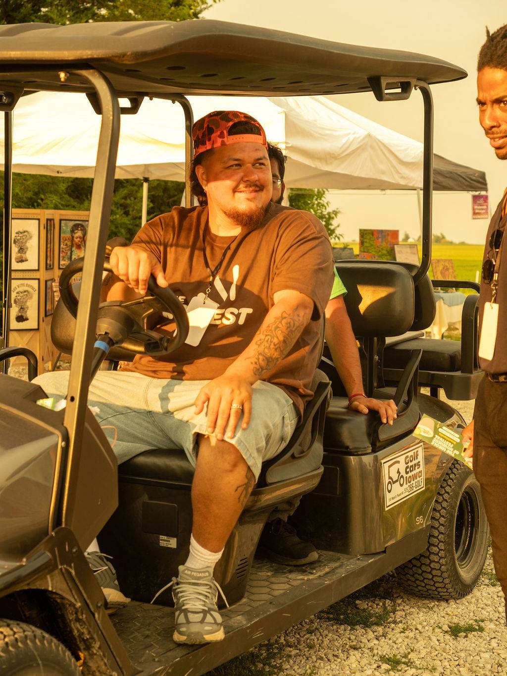 siricasso driving a golf cart