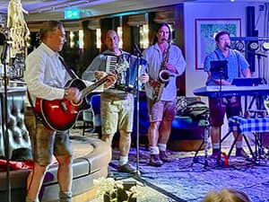 four musicians playing their intruments