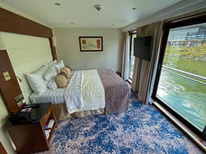 stateroom of a ship seen on a Tauck tour