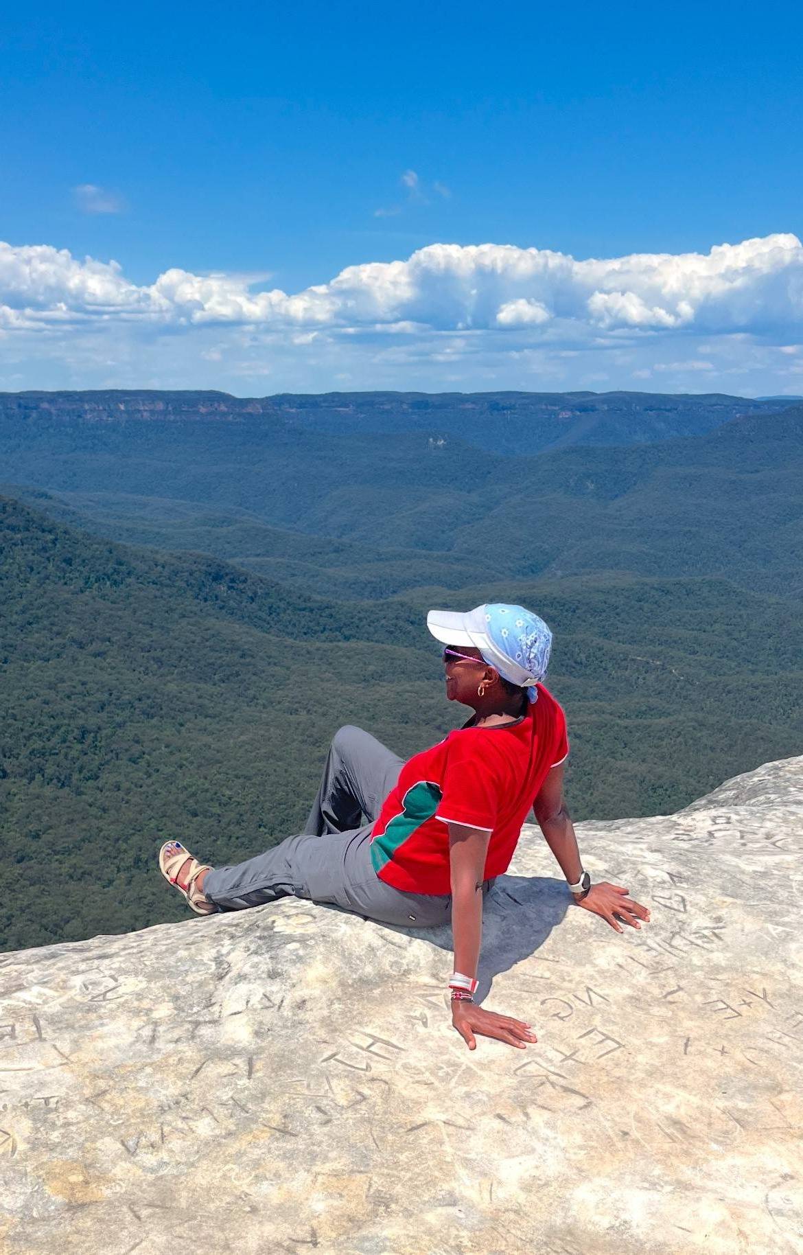 Reflective thought staring at beautiful mountain range scenery