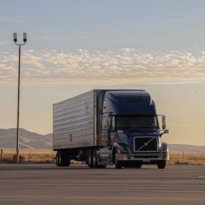 black truck on road during daytime