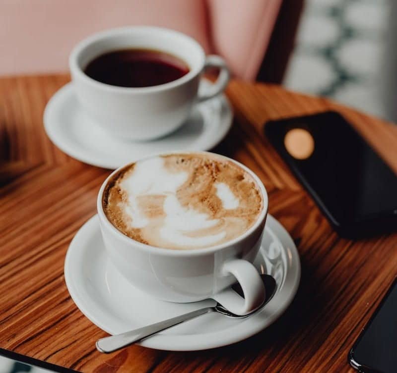 Cup of coffe and tea on the table