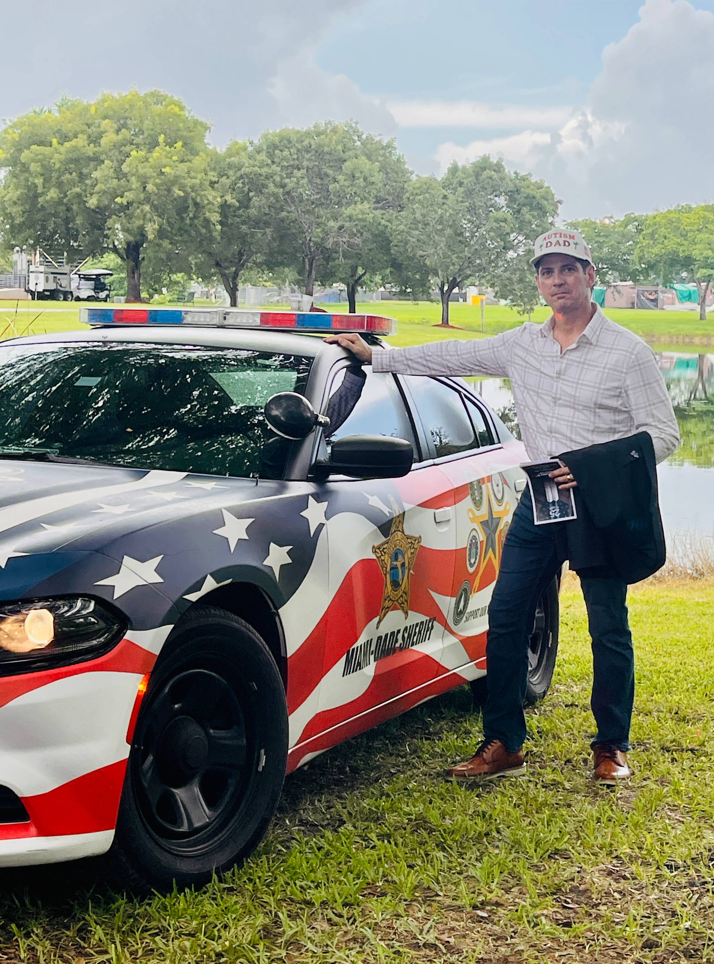 Miami Autism Dad with police car