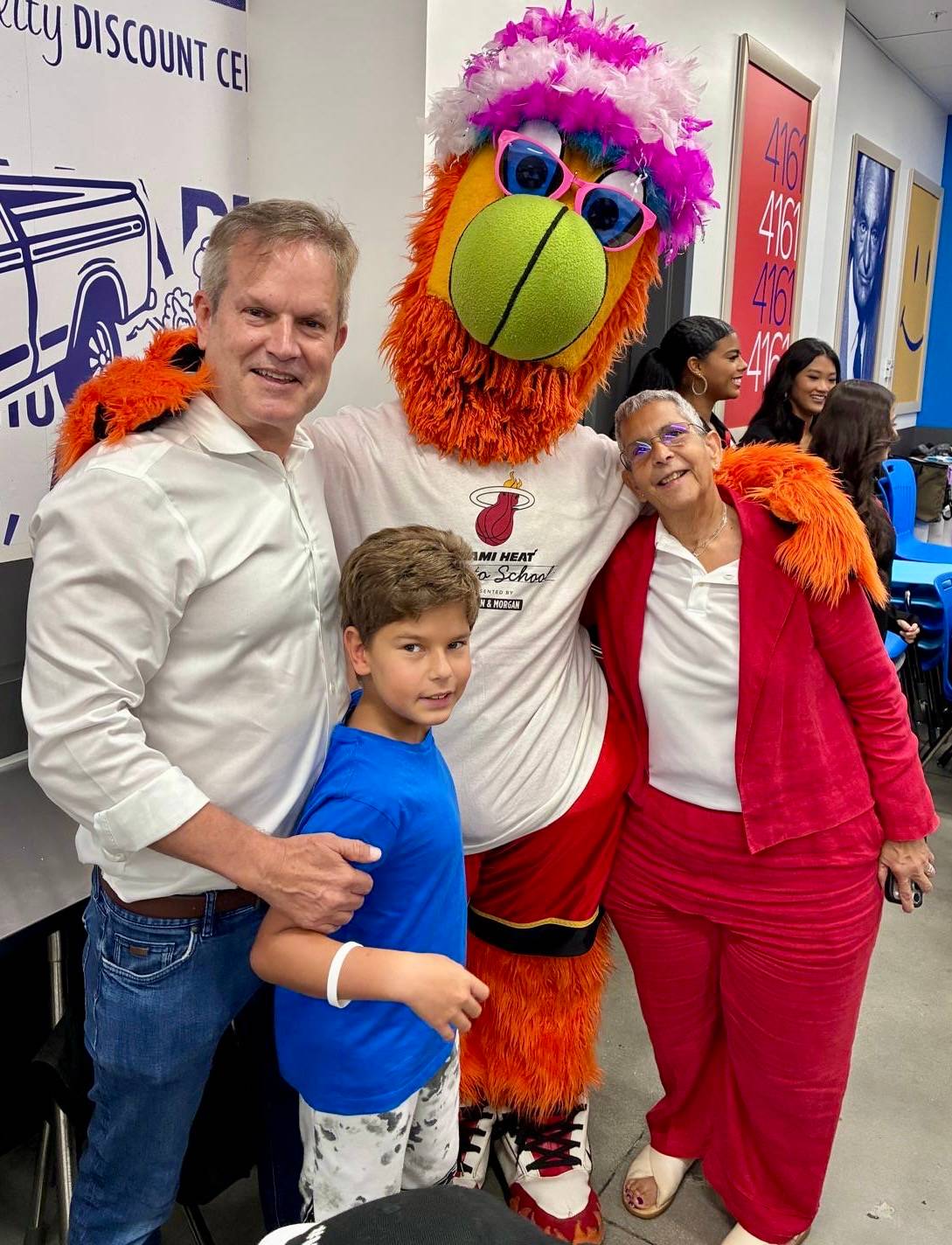 family photo with miami heat mascot burnie