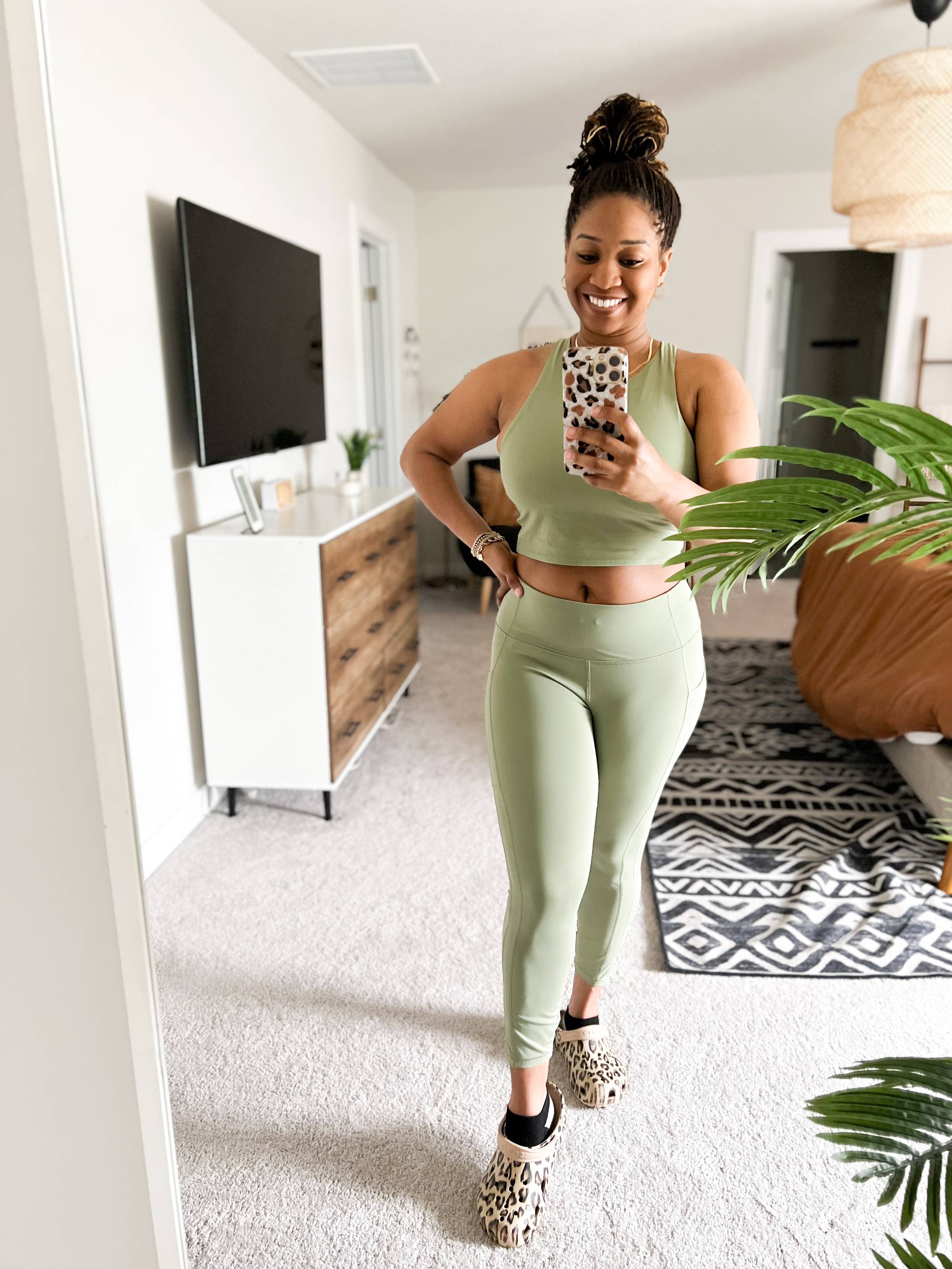 tasha wearing crop top and leggings