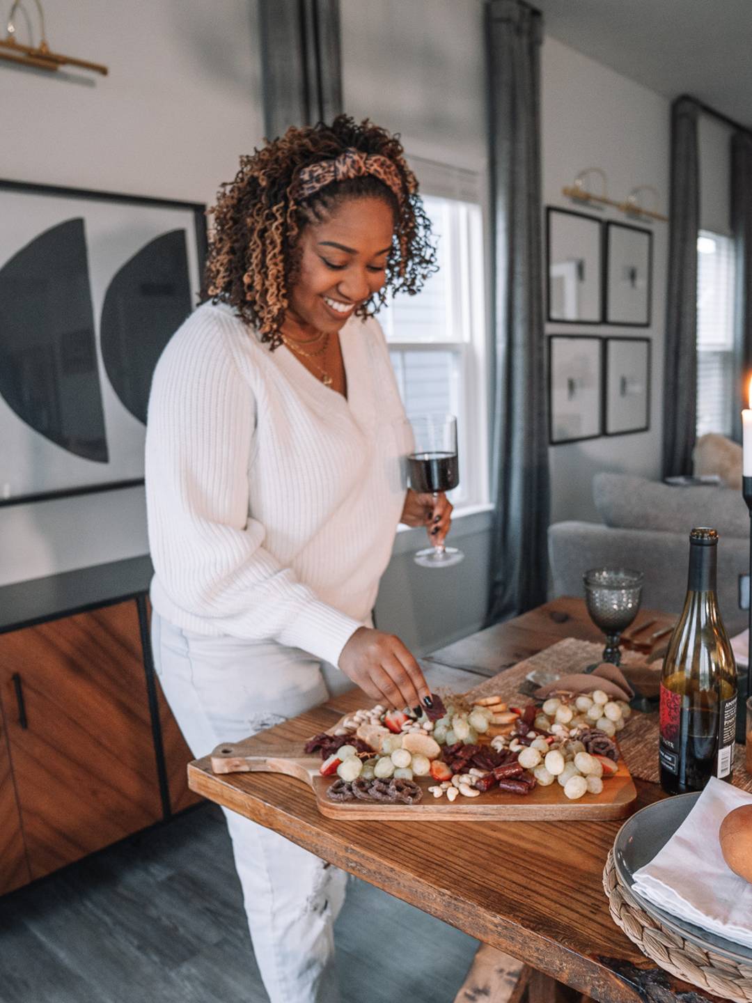 wine glass and charcuterie board