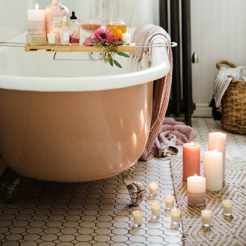 white ceramic bathtub with water