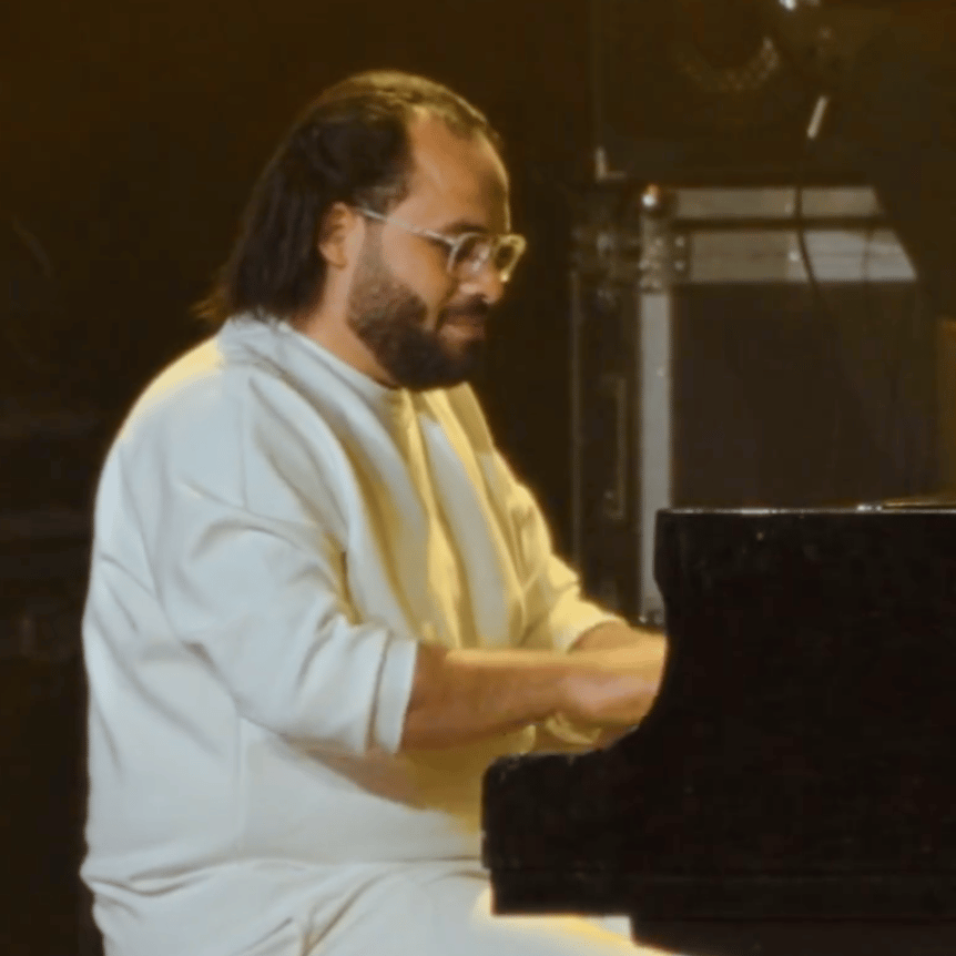 Man plays the piano