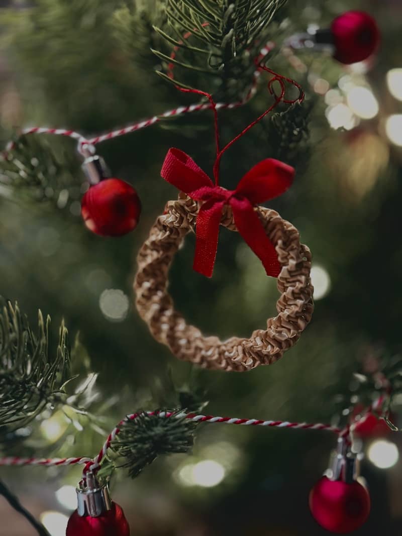 A close up of a christmas tree with ornaments