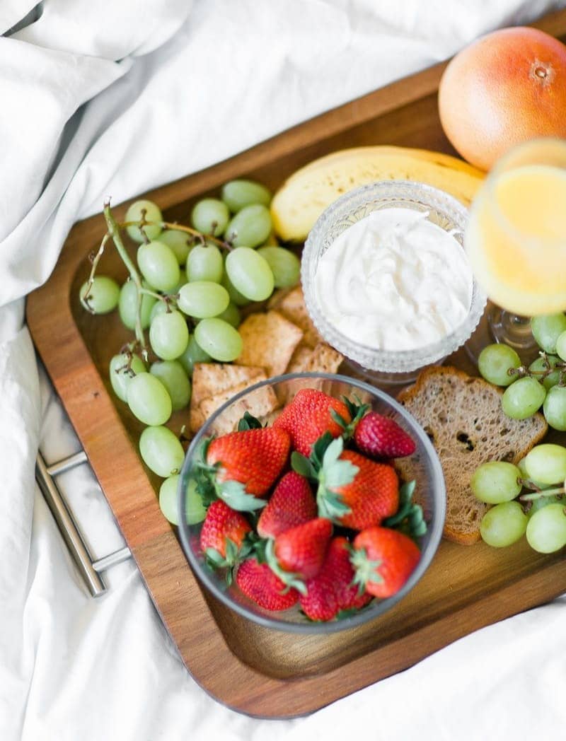 variety of fruits with dip on tray
