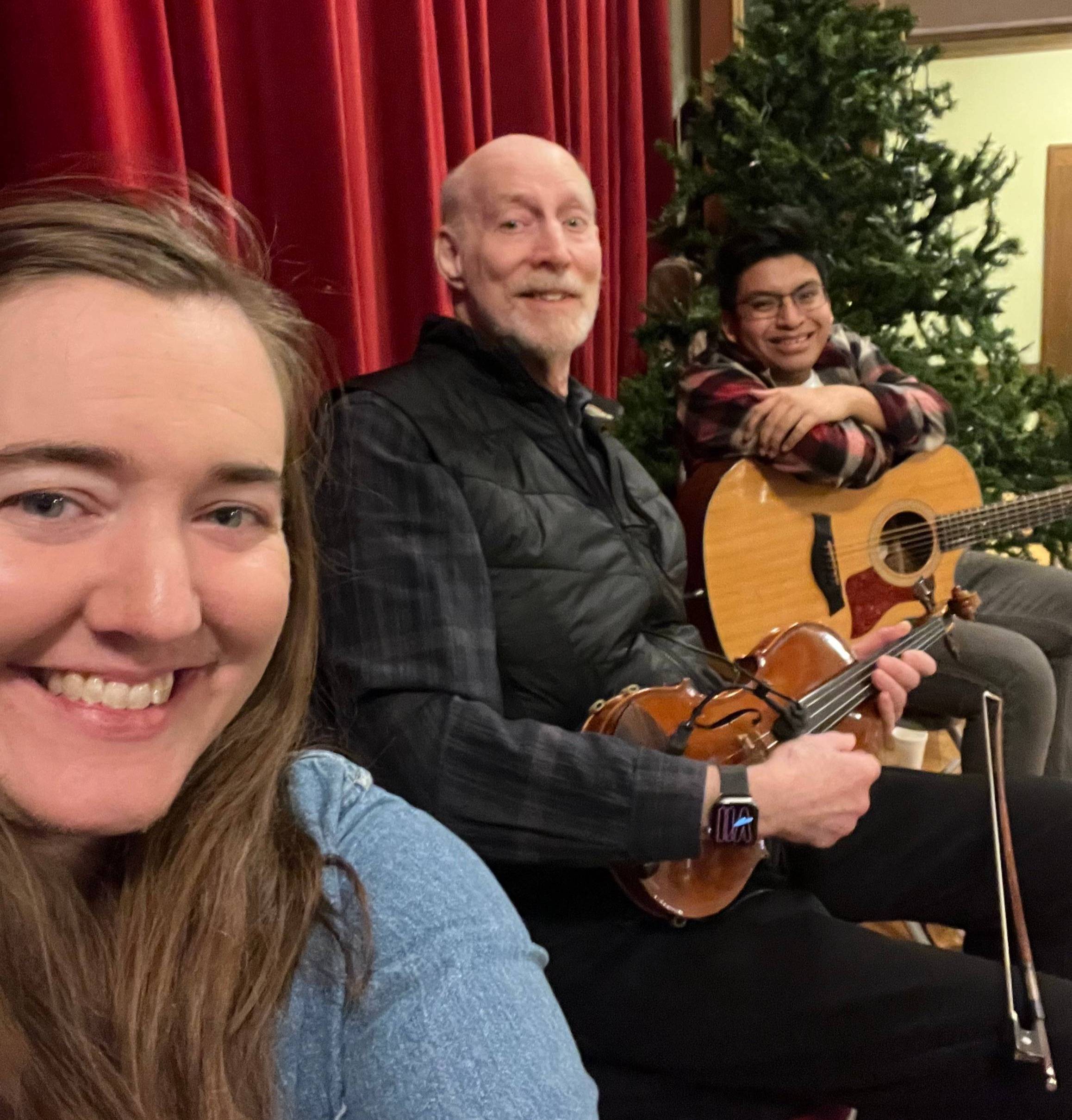 Hannah, Marty Somberg and Bear Whitmer ready to play for dancers in Lansing to ring in the New Year