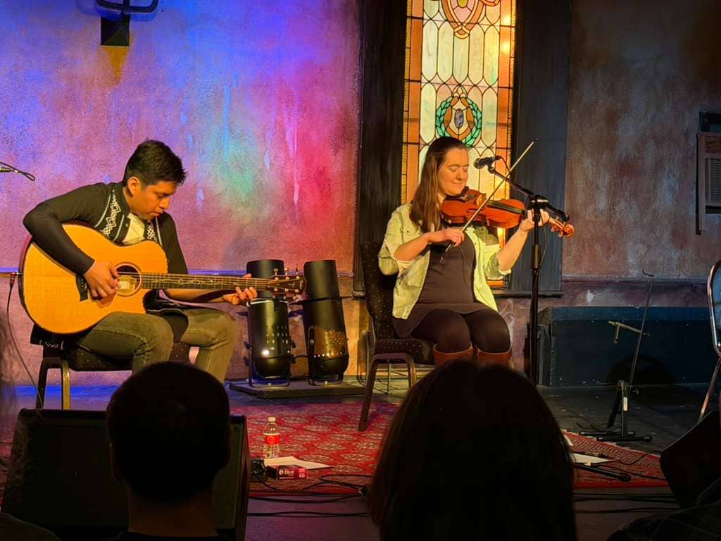 Alberto Whitmer and Hannah Harris playing onstage at Trinity House in Livonia Michigan