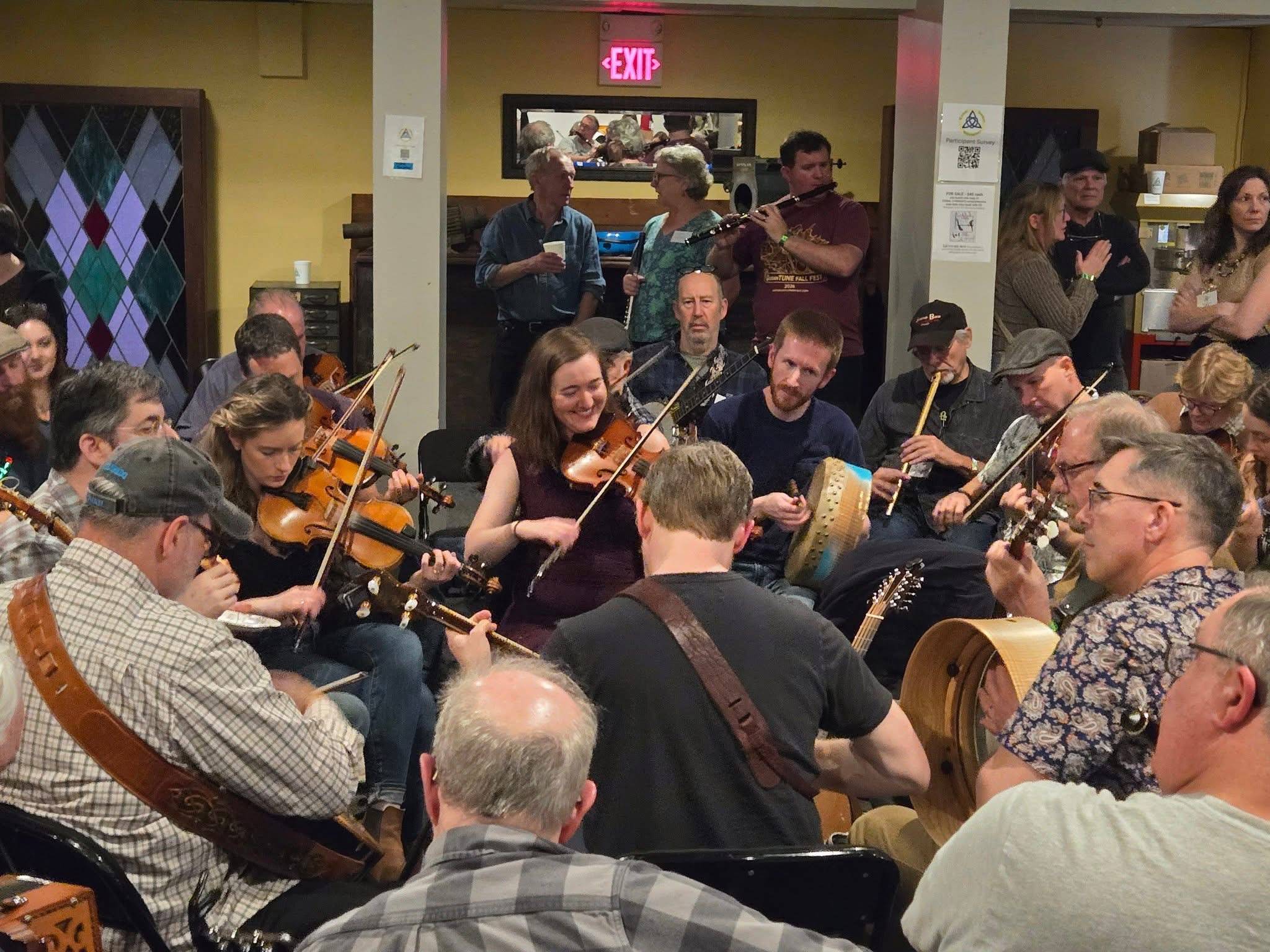 Musicians gathered at a traditional Irish session