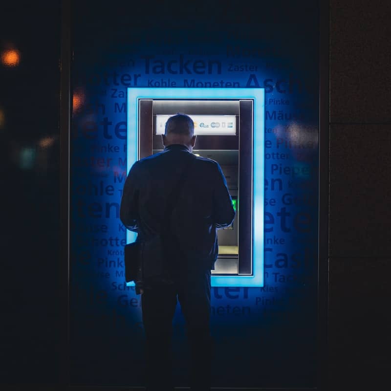 A man withdrawing money from his bank account