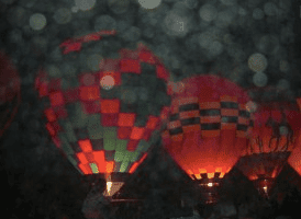 orbs dancing around hot balloons
