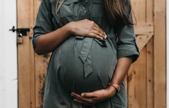 pregnant near door