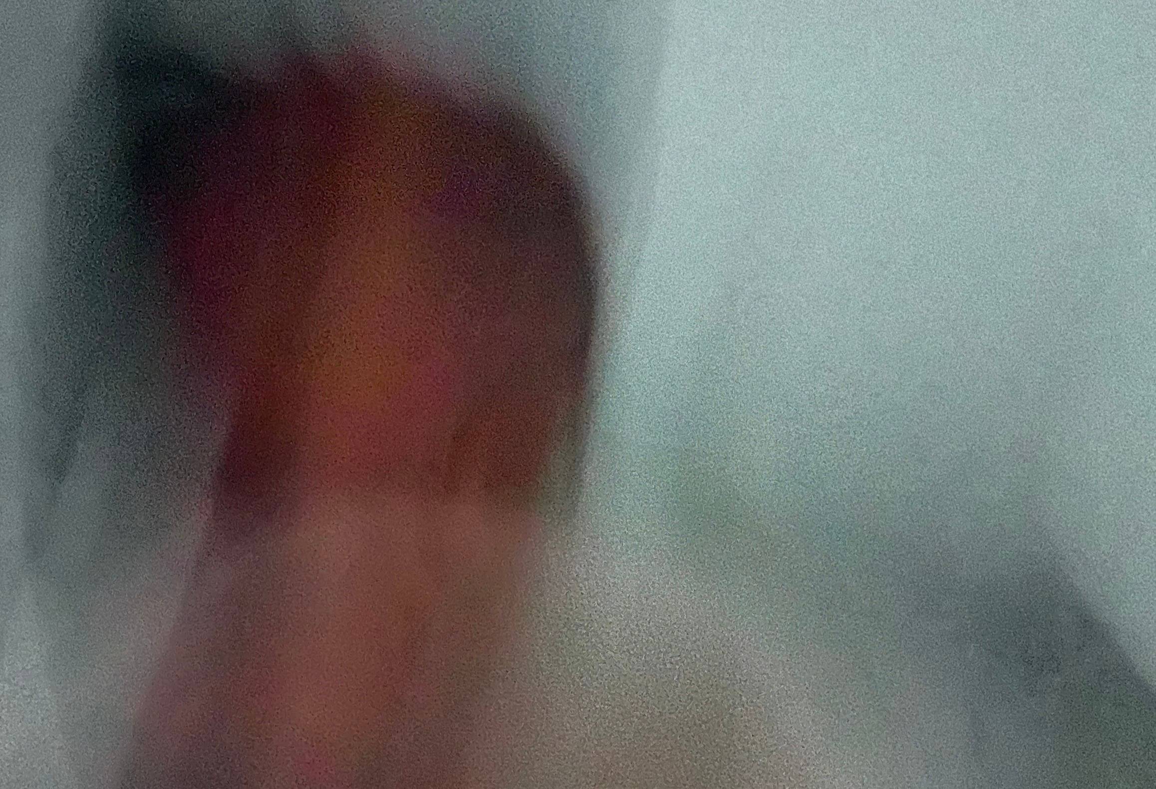 blurry image of a black boy 