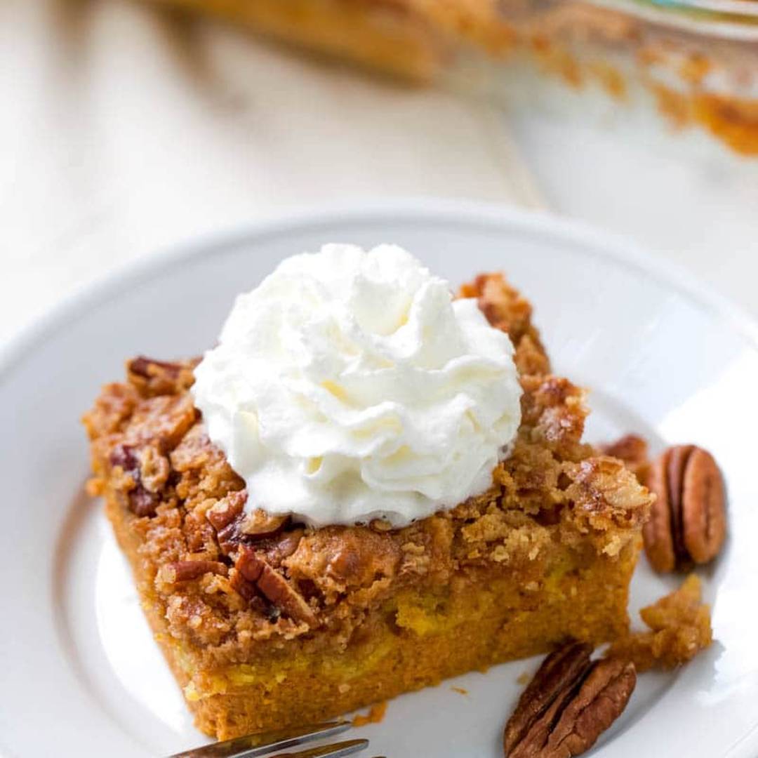 Pumpkin Dump Cake with whipped cream. 