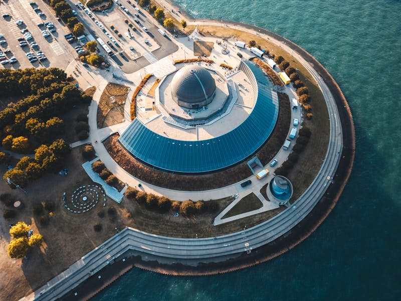 An aerial view of a building in the water