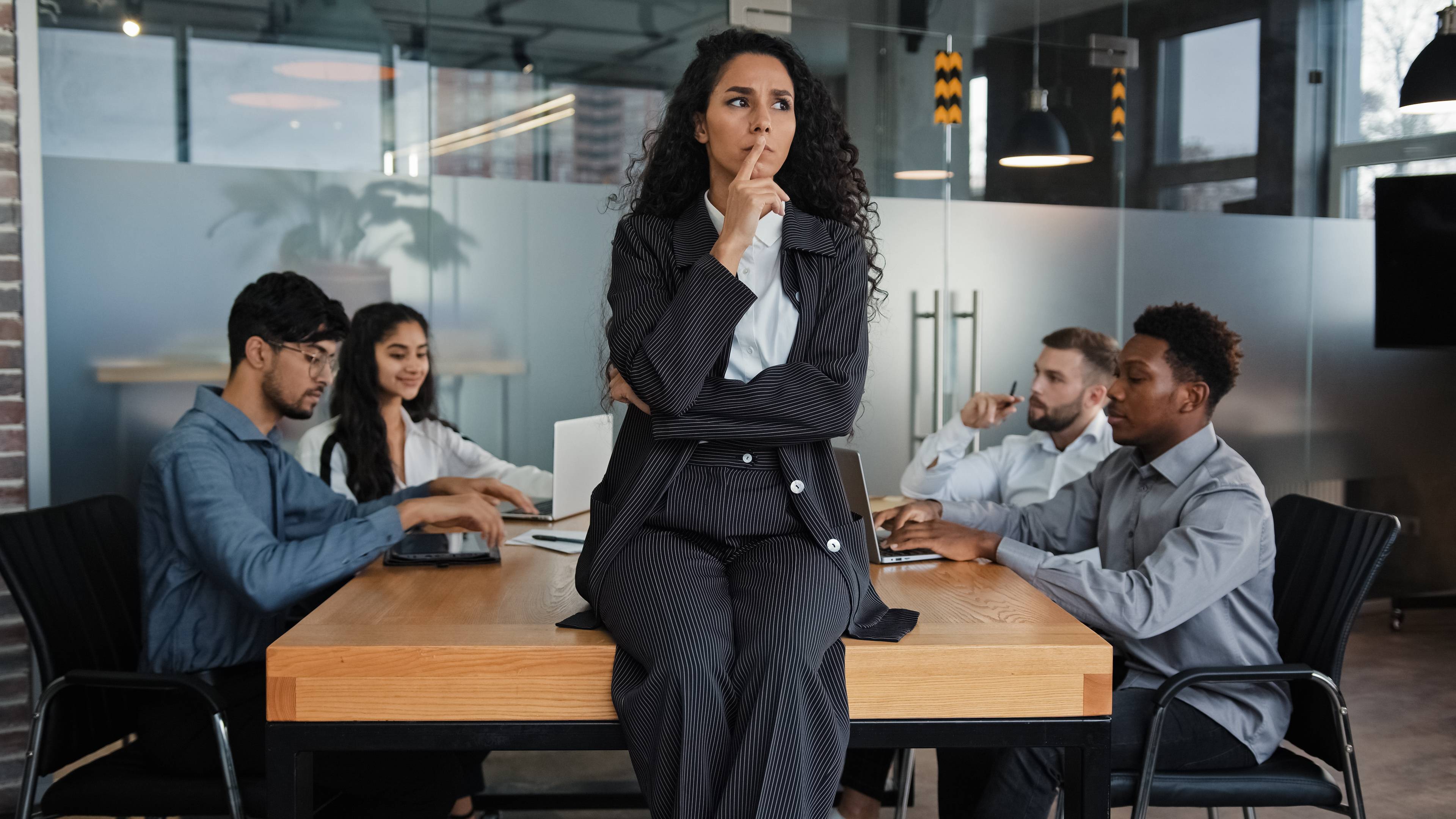 Thoughtful woman at work