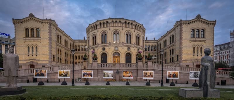 Grand building with an outdoor exhibition in front