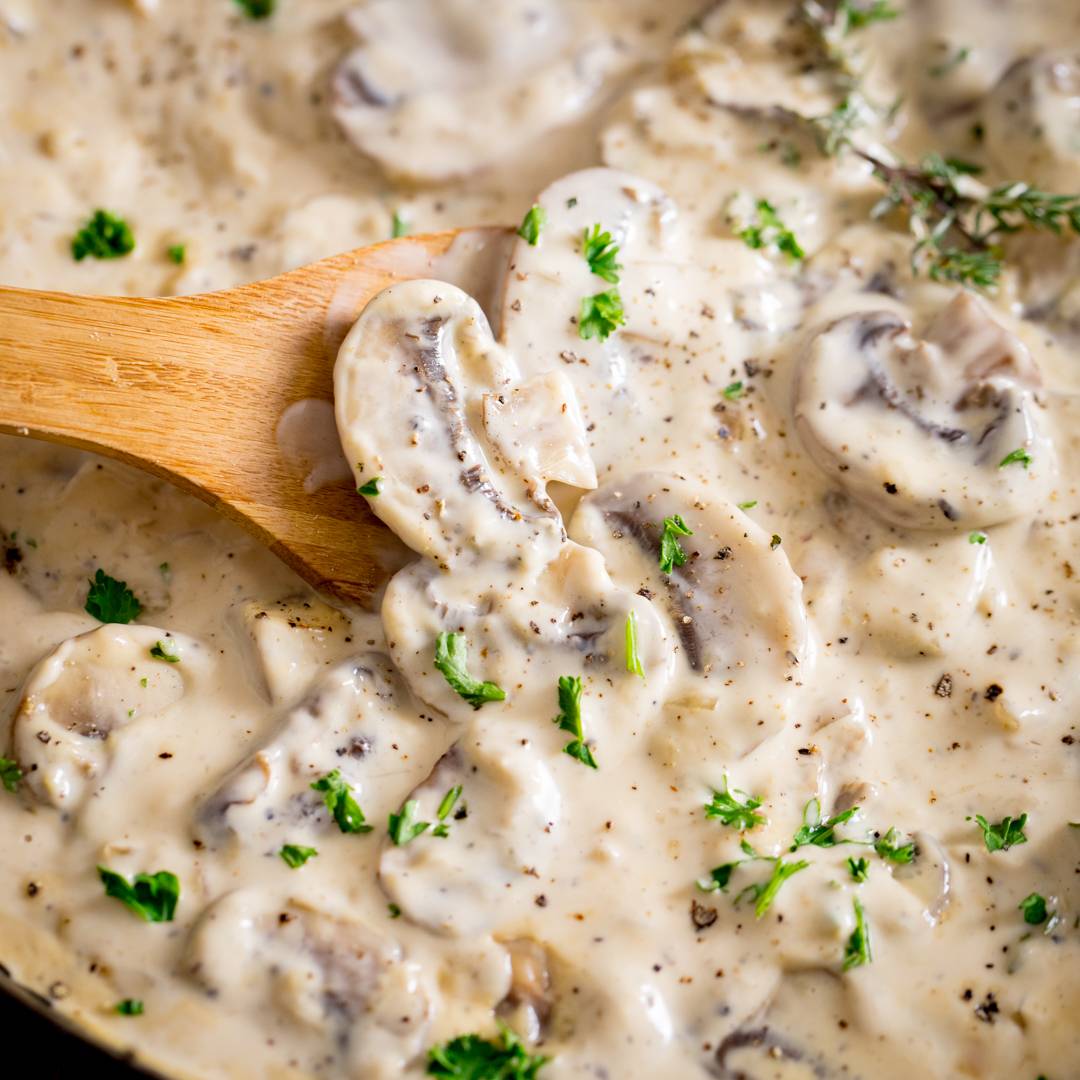 Creamy mushroom sauce in a pan.