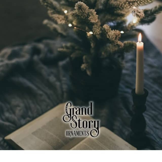 white book page with lighted candle