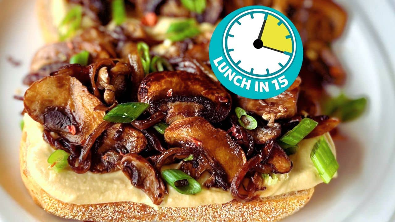 sauteed mushrooms on rye toast with hummus and clock face showing 15 minutes