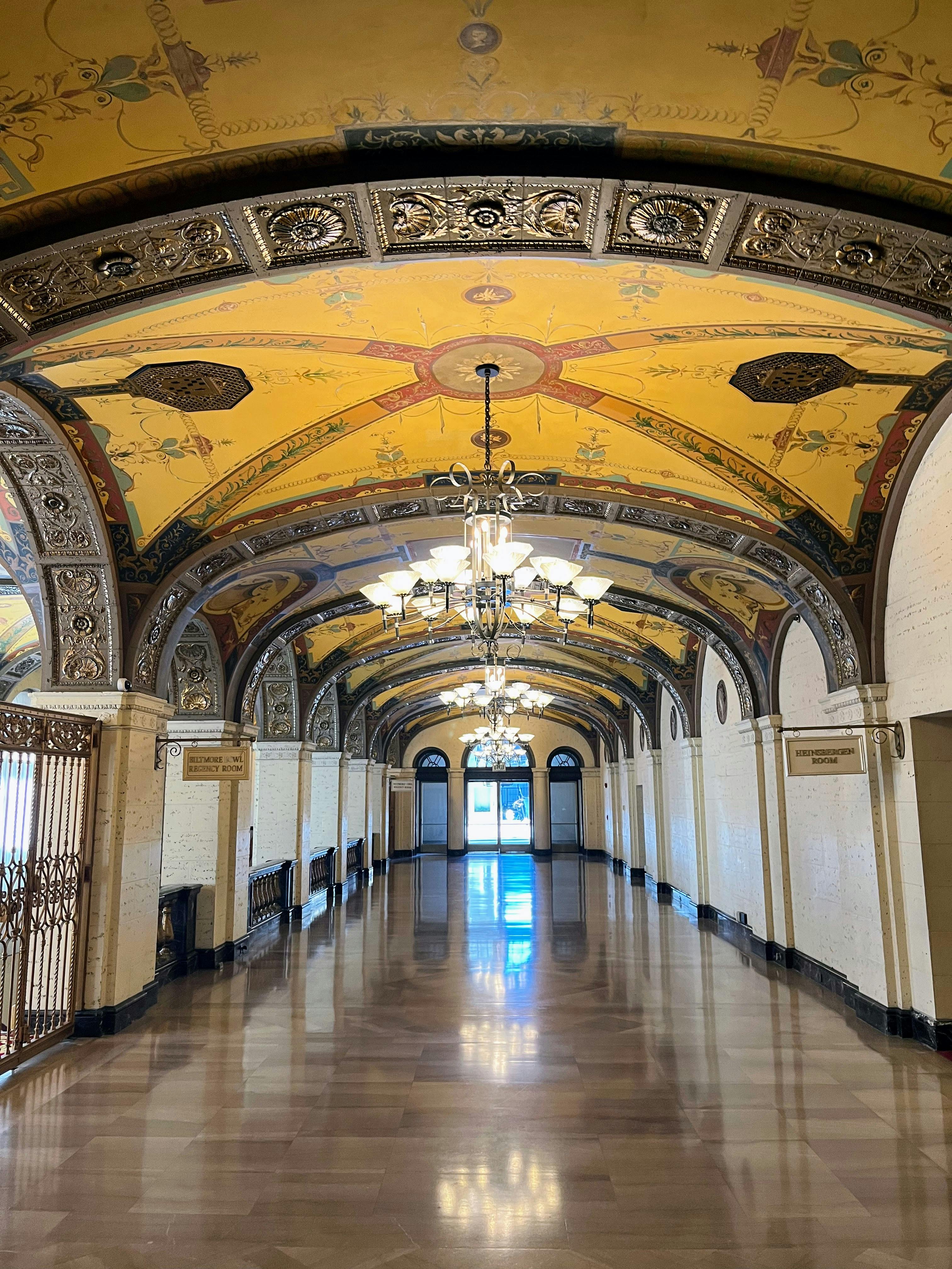 The Arcade of the Biltmore hotel with intricately designed ceiling