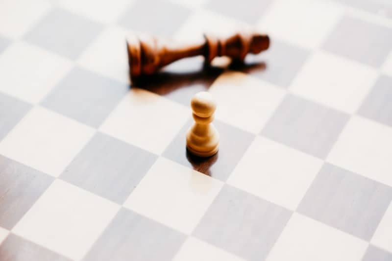 The pawn triumphs over the fallen king.